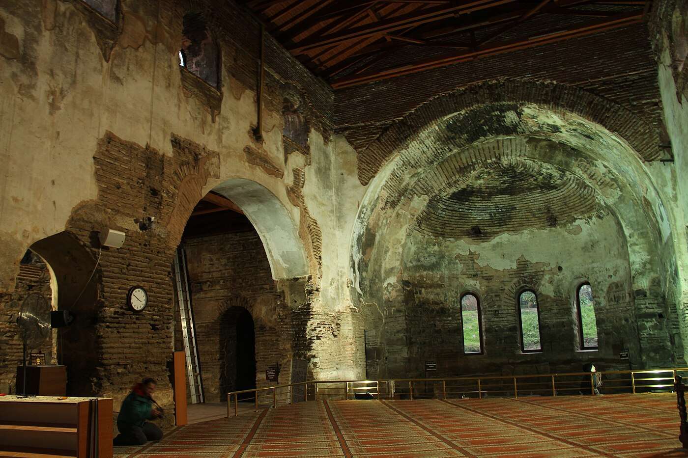 The Byzantine apse and prayer carpets inside İznik's Hagia Sophia mosque